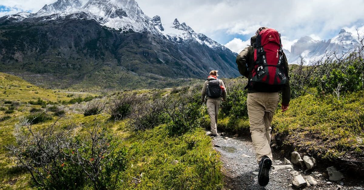 Hikers in Chile. Photo by Toomas Tartes, Unsplash