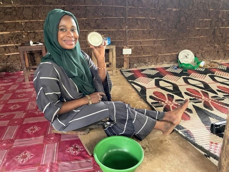 Lutfia Ussi sitting on the coconut chair