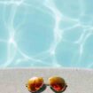 Sunglasses beside pool, Pinterest. Photo by David Lezcano, Unsplash
