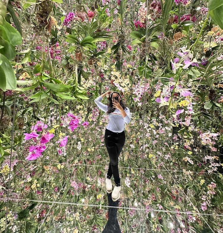 Taking a stroll inside the body immersive art - Floating Flower Garden at teamlab SuperNature Macao. Photo by Pooja Amritkar