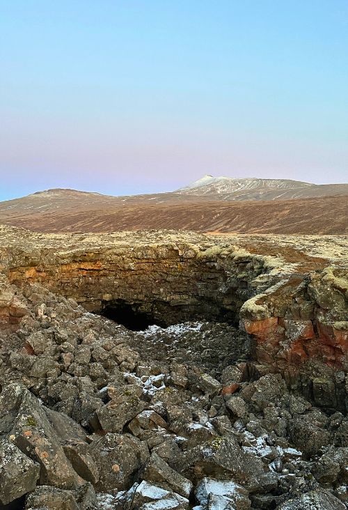 The entrance to Víðgelmir Cave. Photo by Isabella Miller