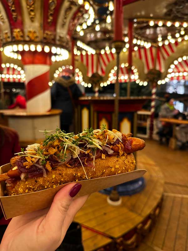Vegan hot dog made with carrot at the Fulda Christmas Market in Germany. Photo by Janna Graber