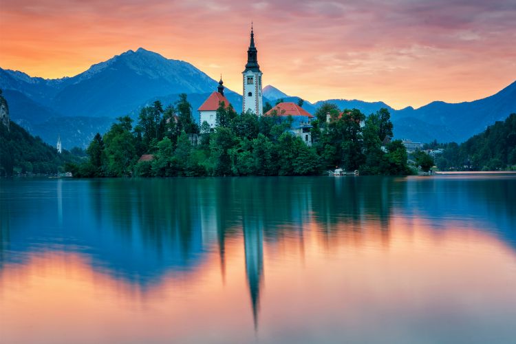 Bled Castle at sunset. Photo by Canva