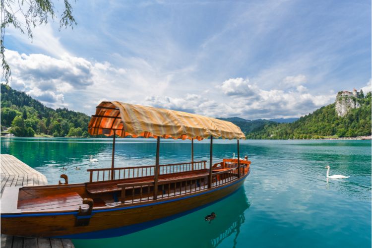 Boat on Lake Bled. Photo by Canva
