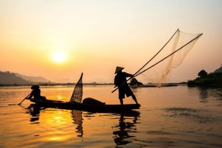 Golden hour on the Mekong Delta, where the rhythm of river life has remained unchanged for generations. Photo by Canva
