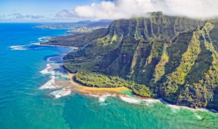 Nothing quite as stunning as the Na Pali coast in Kauai. Photo by Canva