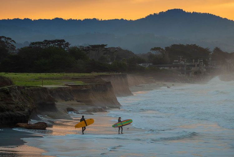 Getting ready to catch some waves at Surfer's Beach. Photo credit Jeff Regan Photography