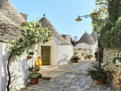 The cone-roofed trulli of Alberobello have been standing since the 14th century. Photo by Reisetopia via Unsplash