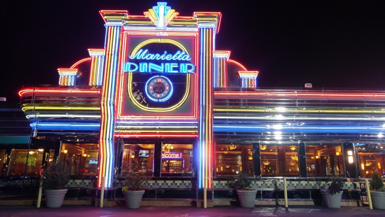 Bright neon lights attract people to the Marietta Diner in Georgia