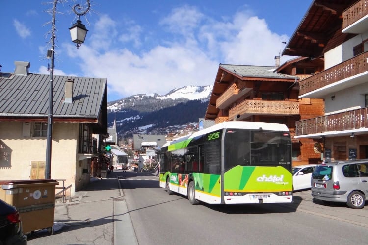 Staying slightly away from the slopes and using free resort shuttles can save hundreds on accommodation costs. Photo by cascoly via Canva