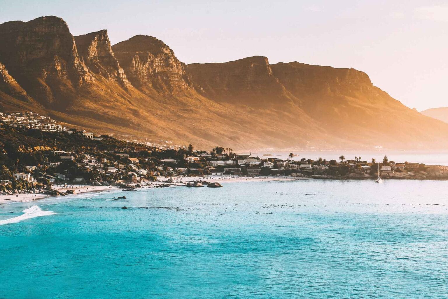 Cape Town’s dramatic coastline stretches beneath Table Mountain’s shadow. Photo by kylefromthenorth, Unsplash