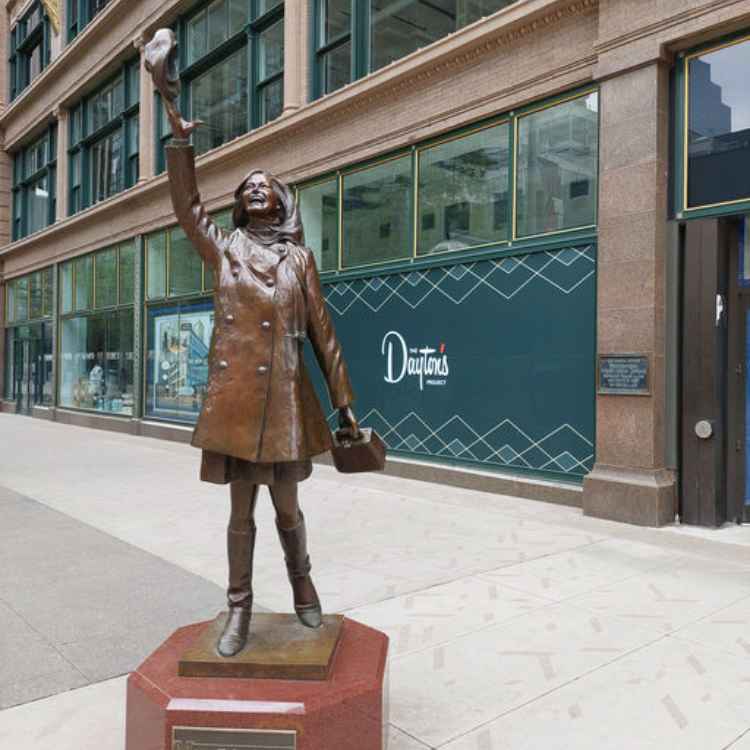 Mary Tyler Moore is immortalized with a bronze of her likeness. Photo courtesy of Minneapolis City & Skyway Tours.
