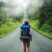 Woman traveler. Photo by Unsplash +