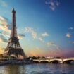 The Eiffel Tower bathes in golden sunset light—just the beginning of Paris's enchanting experiences awaiting discovery. Photo by Givaga from Getty Images Pro via Canva