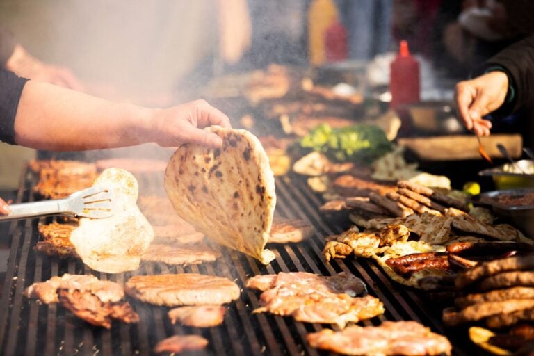 Balkan food BBQ. Image by Mladenovic from Getty Images via Canva