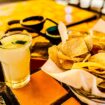 Closeup of margarita, chips and salsa at El Encanto in Cave Creek, on the list of author's list of where to eat in Scottsdale.