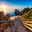 This beach in Portugal's Algarve region is one of many breathtaking beaches found throughout Europe. Image by DaLiu from Getty Images via Canva