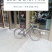 Pinterest - A black bicycle is parked in front of a store with large glass windows