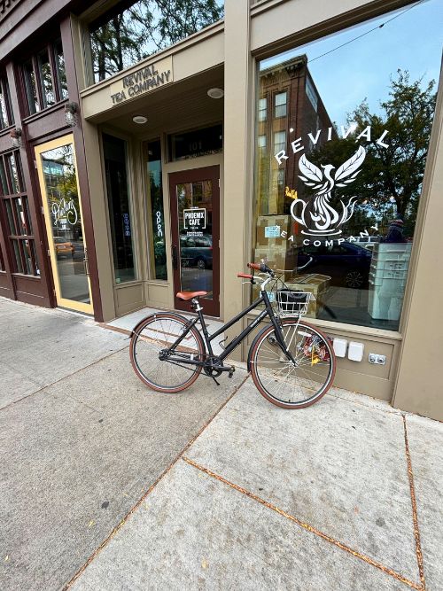 The author used a free bicycle from the Davenport Hotel to explore local businesses, such as the Revival Tea Company, in Spokane. Photo by Mindy Sink