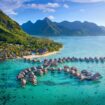 An aerial view of the overwater villas at Hilton Moorea Lagoon Resort & Spa in Moorea, French Polynesia