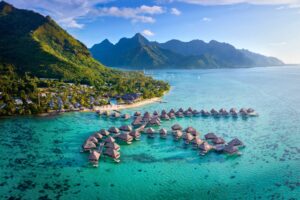 An aerial view of the overwater villas at Hilton Moorea Lagoon Resort & Spa in Moorea, French Polynesia