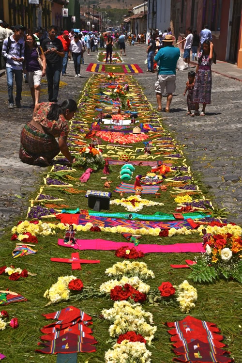 Christian and Mayan symbols are lovingly laid out in bright colors.