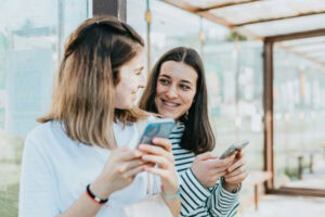 Two women smiling