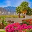 Bright bougainvillea and swaying palms frame the iconic Palm Springs sign, a perfect welcome to this desert oasis. Photo by Ron and Patty Thomas from Getty Images Signature via Canva