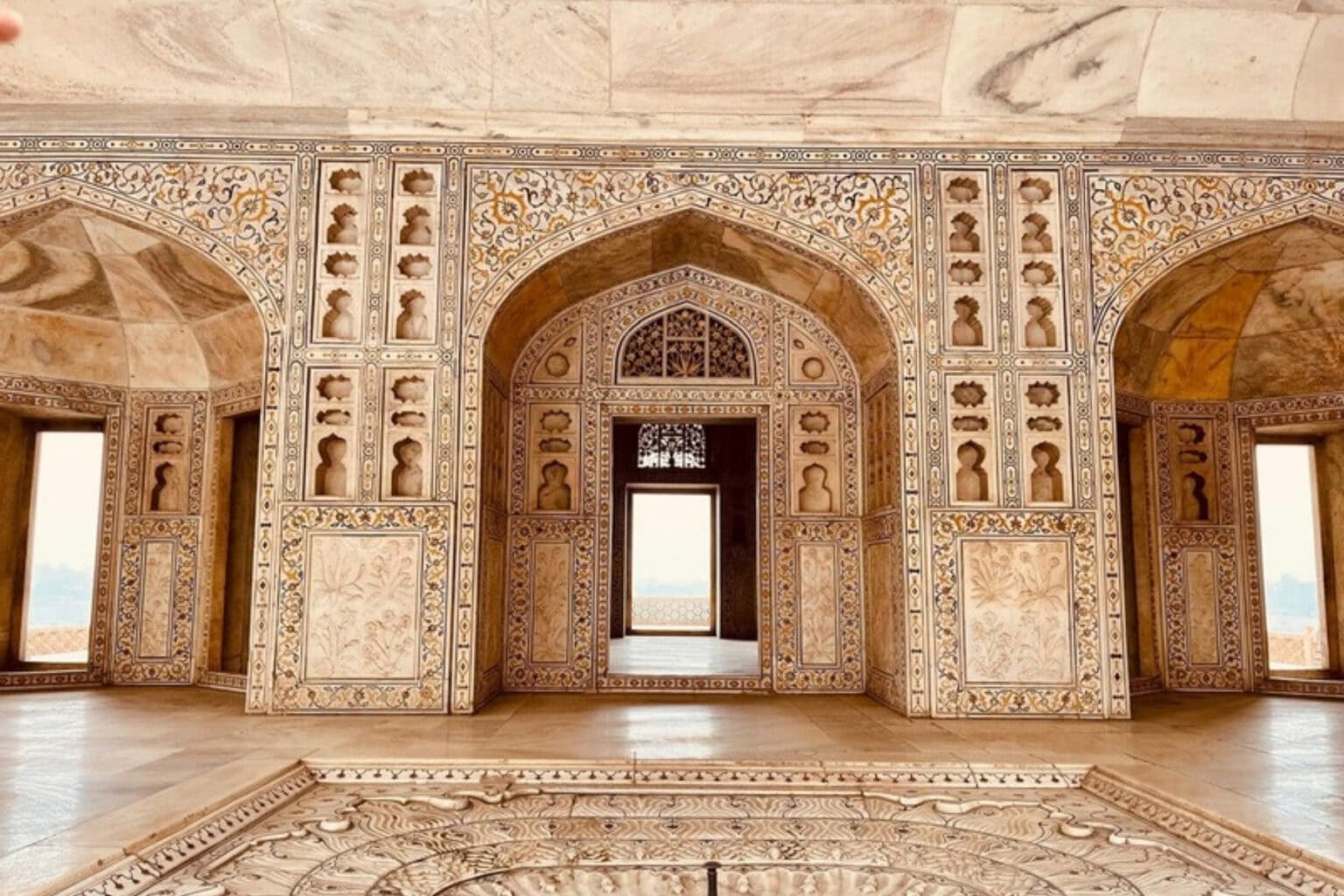 Exquisite marble interiors of Agra Fort, a testament to Mughal craftsmanship and grandeur. Photo by Haian Dukhan