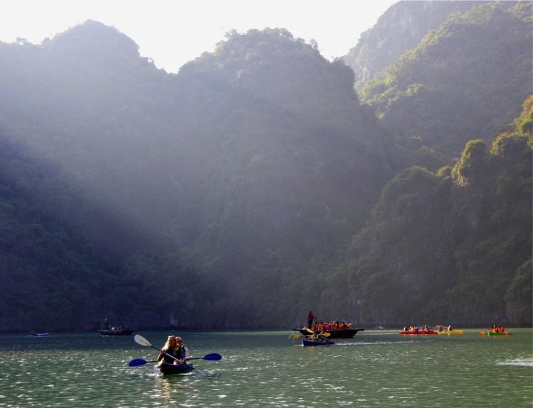Kayaking on the tranquil waters of Ha Long Bay in Vietnam