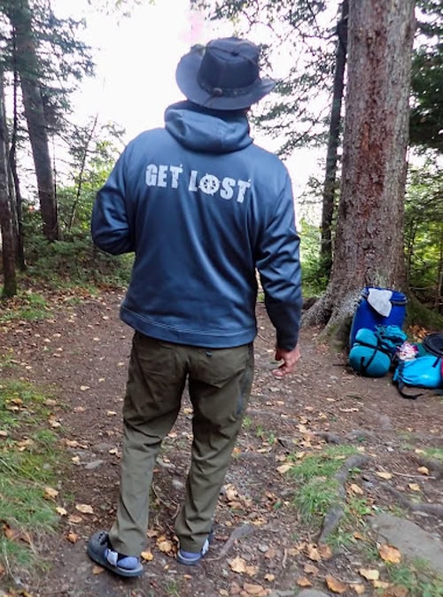 One of our canoeing instructors, guide, and cook telling us to Get Lost