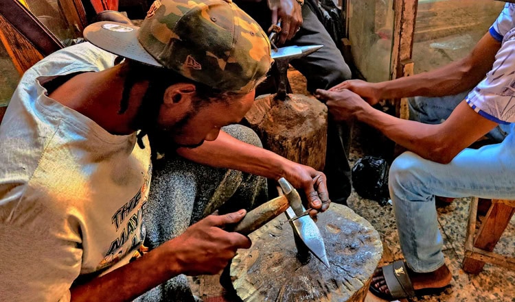 Jewelry artisan in the Central Market of Bamako, the capital of Mali.