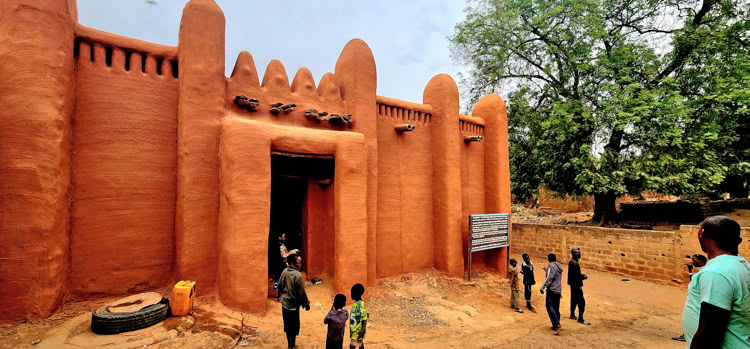 The palace of the King of Bambara who rules over the small mud village of Sekou Kora