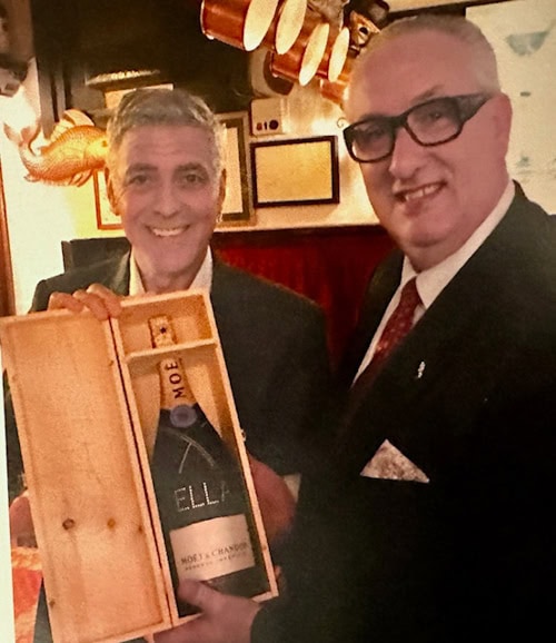 George Clooney with Fracassi in Da Ivo’s photo gallery.