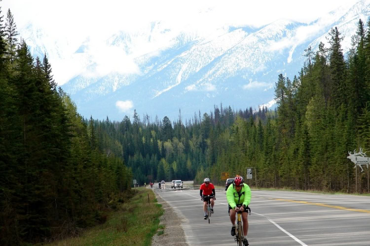 A cyclist on the Icefields Parkway in Canada