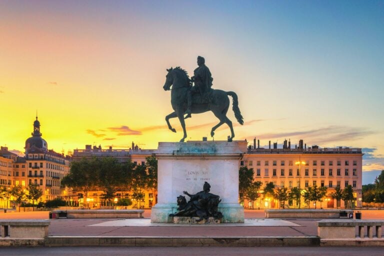 The magnificent Place Bellecour, Lyon's central square and the largest pedestrian plaza in Europe, serves as the beating heart of this UNESCO-listed city where the Rhรดne and Saรดne rivers converge. Image by tichr from Getty Images via Canva