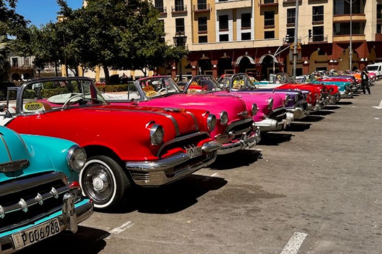 Candy colored classic cars at Kempinski.