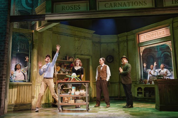 Little Shop of Horrors actors on stage