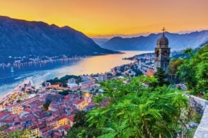 The Bay of Kotor at sunset, one of Montenegro's most breathtaking views. Photo by SCStock from Getty Images via Canva