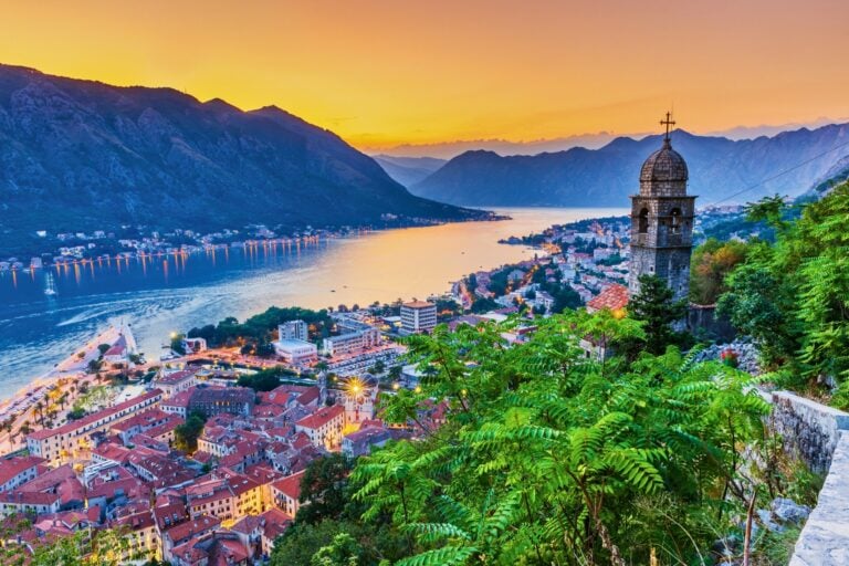 The Bay of Kotor at sunset, one of Montenegro's most breathtaking views. Photo by SCStock from Getty Images via Canva