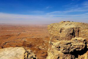 View across the desert floor from the Berber hamlet of Tarmisah. Photo by Edward Placidi