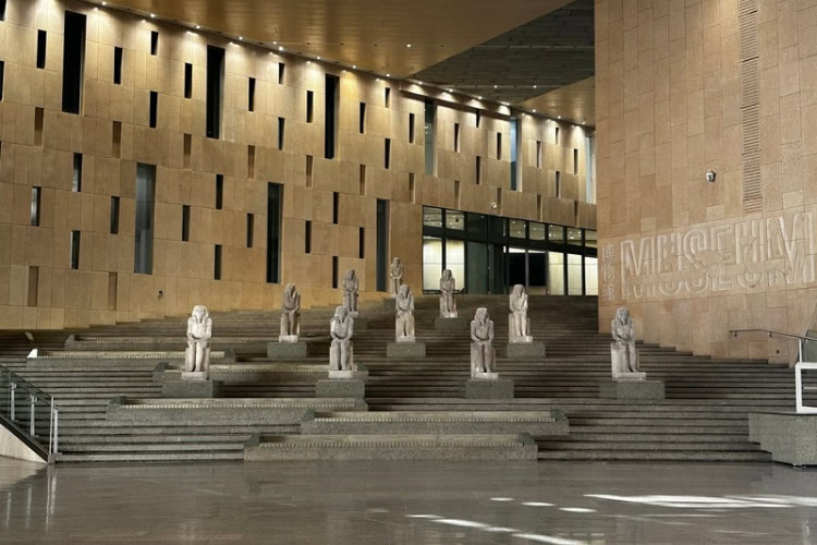 A large staircase with statues greets you as you enter the Grand Egyptian Museum