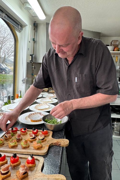 chef preparing food on a Scotland cruise