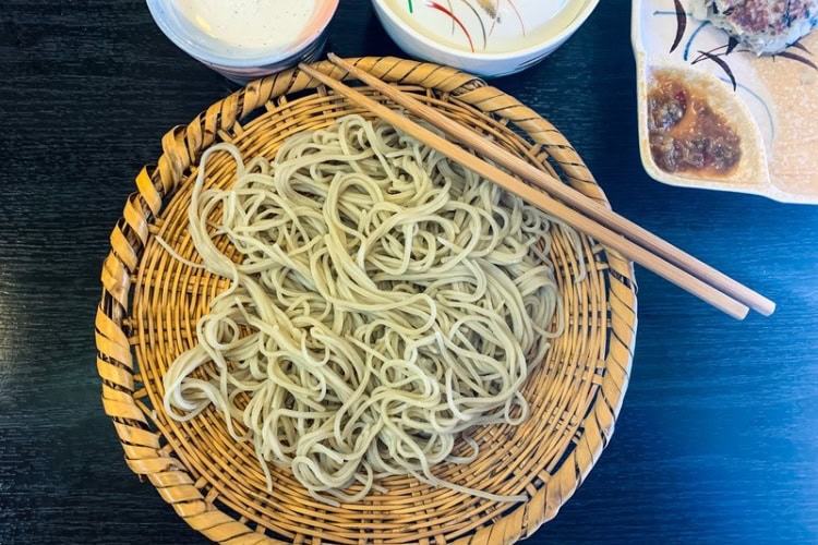 Soba noodles are local to Nagano Prefecture, traditionally served in a basket with accompaniments.