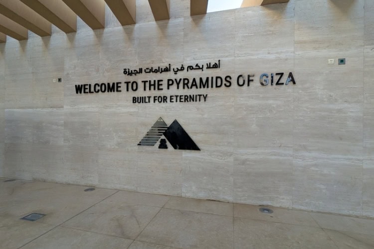 The welcome sign for the Pyramids of Giza