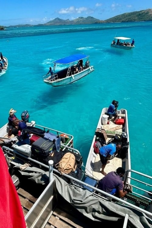 Runabouts picking up guests from the ferry at South Sea Islands.