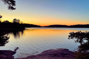 Sunset at Varmora Campsite, Bogesundslandet Nature Reserve, Sweden. Photo by Rob Rogers