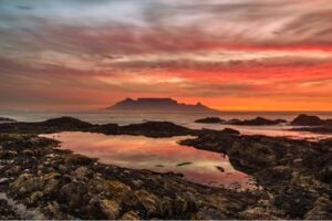 Beach sunset in Cape Town. Photo by Alexcpt from Getty Images via Canva
