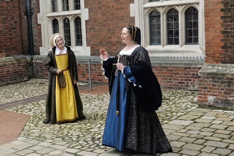 Docents in character share gossip at Hampton Court Palace