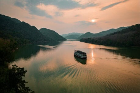 The Boheme cruising at sunset. Photo courtesy of Mekong Kingdoms